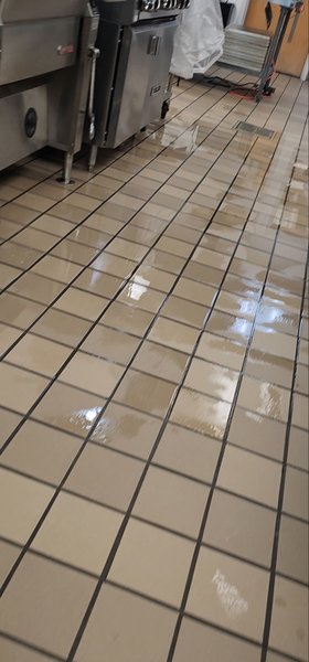 Standing water on the floor under equipment found on 10/26/23