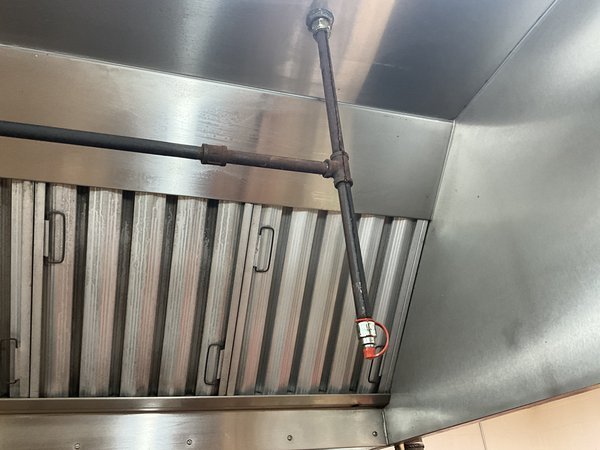 Suppression system with water running down